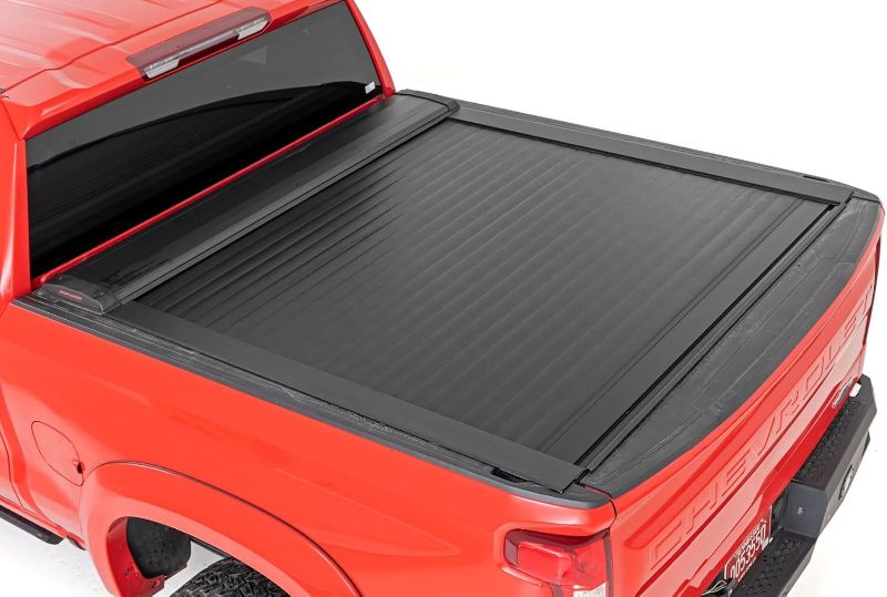 Photo 1 of *****MISSING HARDWARE **** Rough Country Retractable Truck Bed Cover, Truck Tonneau Covers for Chevy Silverado 1500 / GMC Sierra 1500 (2019-2024) - 5'10 (69.9") Weather-Resistant Truck Bed Cover, Retractable Bed Cover
