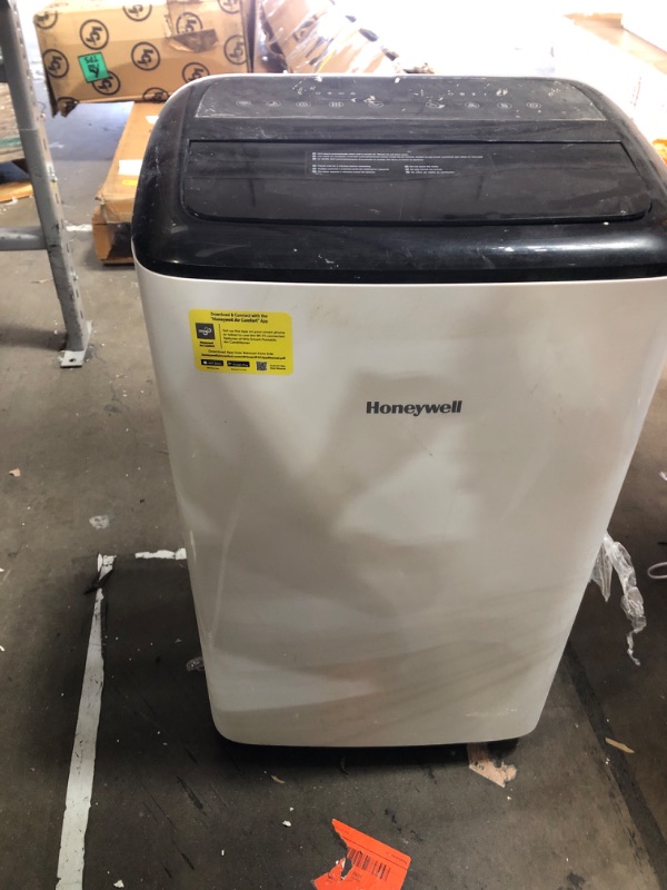 Photo 2 of ***MINOR DAMAGE *** Honeywell 10,000 BTU Smart Portable Air Conditioner and Dehumidifier, Cools Rooms Up to 450 Sq. Ft., Portable AC with WiFi, Alexa Voice Control, Included Drain Pan, White