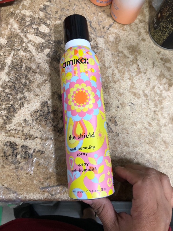 Photo 2 of amika the shield anti-humidity spray