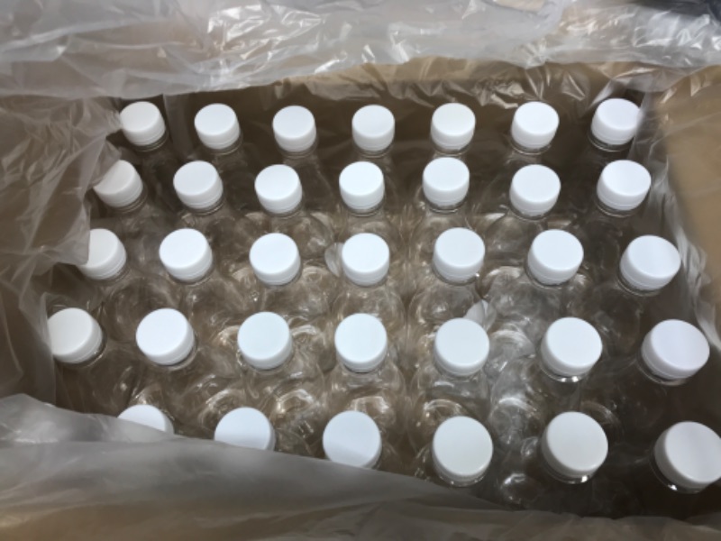 Photo 2 of 10 Oz Empty PET Plastic Juice Bottles 35 Pack Clear Disposable Bulk Drink Bottles with White Tamper Evident Caps Great for Storing Homemade Juices, Milk, Water, Smoothies, Tea (10 OZ, White)