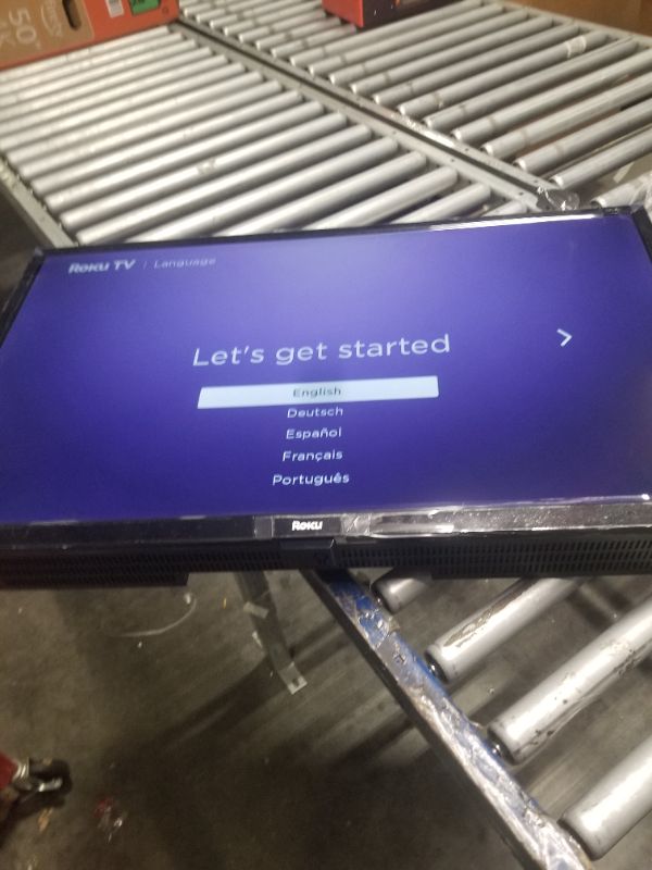 Photo 1 of Roku Smart TV – 32-Inch Plus Series 4K QLED RokuTV Voice Remote Pro