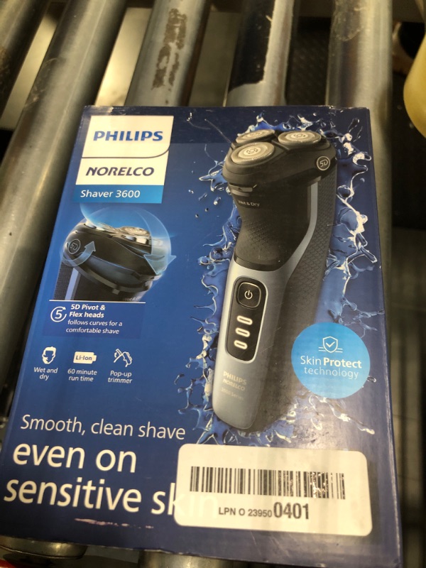 Photo 2 of *MISSING POWER CORD*
Philips Norelco Shaver 3600, Rechargeable Wet & Dry Electric Shaver with Pop-Up Trimmer, Travel Storage Pouch and Protective Cap, S3243/91 Storm Blue Shaver Series 3000