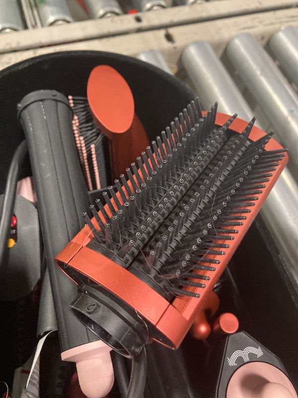 Photo 4 of ****VERY USED, MISSING BRUSH USED TO CLEAN FILTER***
Dyson Special edition Airwrap™ Complete long multi-styler in Strawberry bronze and blush pink with Detangling comb