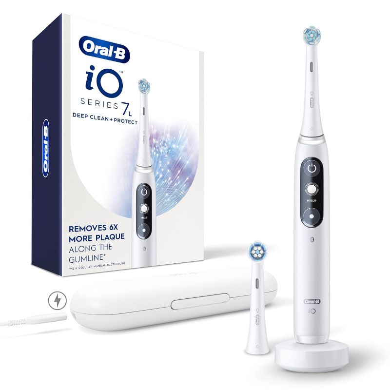 Photo 1 of ***PREV OPENED, APPEARS UNUSED***
Oral-B iO Deep Clean + Protect Rechargeable Electric Toothbrush, White with a iO Series 7 Toothbrush, 2 Replacement Brush Heads, and a Charging Travel Case