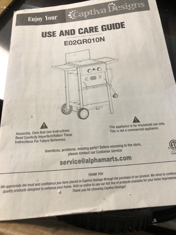 Photo 3 of ***USED - DAMAGED - DENTED - COVERED IN SCRATCHES - MISSING GRIDDLE - OTHER PARTS LIKELY MISSING AS WELL - SEE PICTURES***
Captiva Designs 2-Burner Propane Gas BBQ Grill with Cast Iron Griddle Pan, 20,000 BTU Output Small Barbecue Grill for Outdoor, Patio