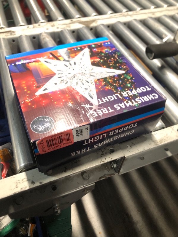 Photo 1 of DG-Direct Christmas Tree Topper Lighted Star [Silver],3D Hollow Sparkling Star Christmas Tree Topper with Rotating Magic Cool White Snowflake Projector for Christmas Tree Ornament (Silver)