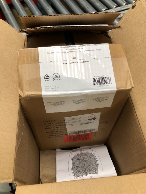 Photo 1 of **NON-REFUNDABLE** (PARTS) Amazon Basics Oscillating Ceramic Space Heater, Portable Heater for Indoor Use, for Office and Home, With Overheat and Tip-Over Protection, Thermostat, 1500W, Black, 7.52"D x 6.34"W x 9.45"H