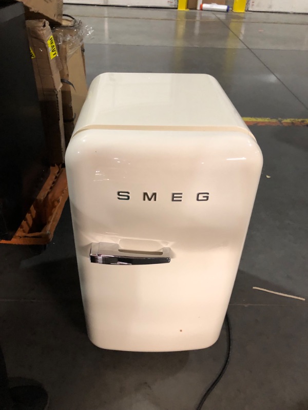 Photo 2 of ***USED - MAJOR DAMAGE - SEE COMMENTS***
SMEG Compact Mini Fridge, Beige, Retro Styling, 19.75" W x 16" D x 29.25" H