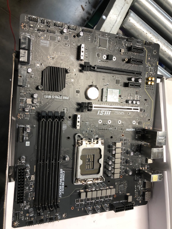 Photo 1 of ***NONREFUNDABLE - MAJOR DAMAGE - PARTS ONLY - SEE COMMENTS***
MSI PRO Z790-S WiFi ProSeries Motherboard (Supports 12th/13th/14th Gen Intel Processors, LGA 1700, DDR5, PCIe 5.0, M.2, 2.5Gbps LAN, USB 3.2 Gen2, HDMI/DP, Wi-Fi 6E, Bluetooth 5.3, ATX)