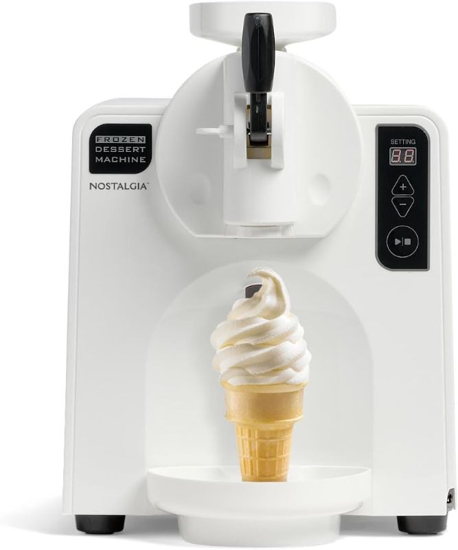 Photo 1 of ***FACTORY SEALED - OPENED TO INSPECT***
Nostalgia Easy-Dispensing Soft Serve Ice Cream & Frozen Dessert Machine, Makes 1 Quart of Ice Cream, Milkshakes, Frozen Yogurt, Gelato in Minutes, Ice Cream Sandwiches, With LED Display, White