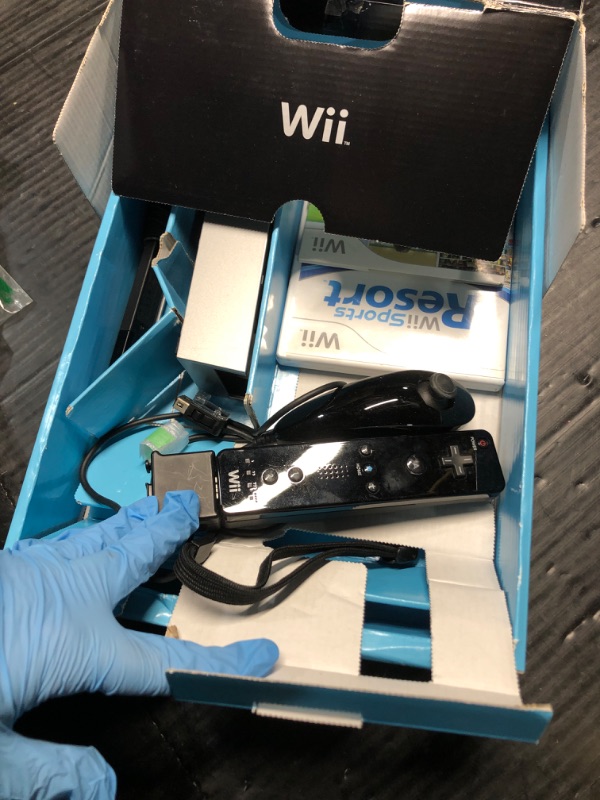 Photo 2 of **FOR PARTS, READ NOTES**
*USED/SCRATCHED**Nintendo Wii Console Black with Wii Sports and Wii Sports Resort