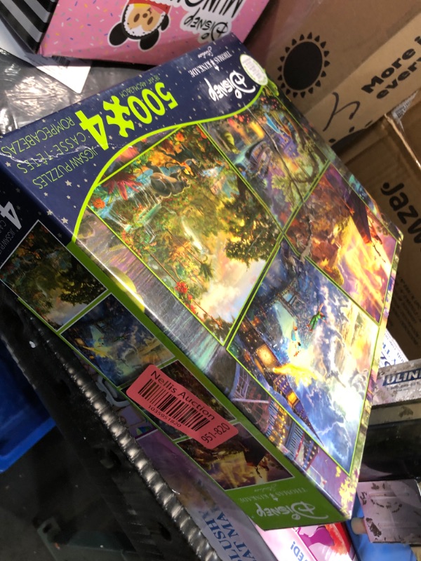 Photo 3 of ***FACTORY SEALED***Ceaco - Thomas Kinkade - The Disney Collection - Four 500 Piece Jigsaw Puzzles including Lion King, Peter Pan, Princess and the Frog & Jungle Book