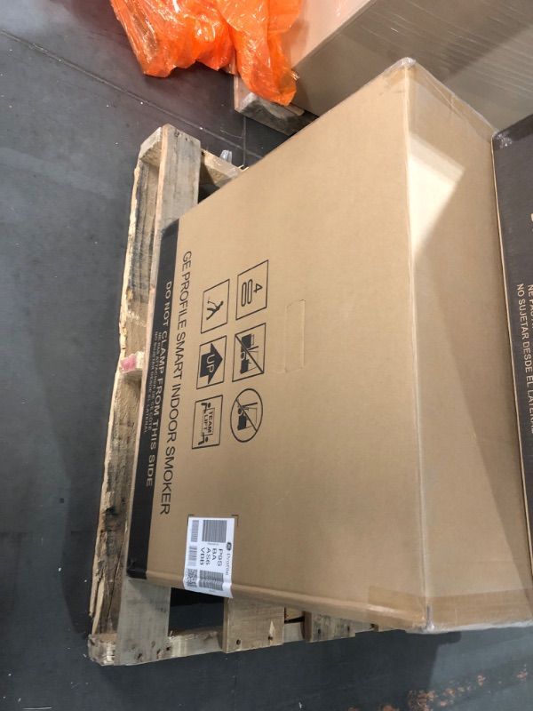 Photo 1 of *** FACTORY SEAL***GE Profile™ Smart Indoor Pellet Smoker, with Active Smoke Filtration, 5 Smoke Control Settings, WiFi Connected, Electric, Countertop BBQ Appliance, Black