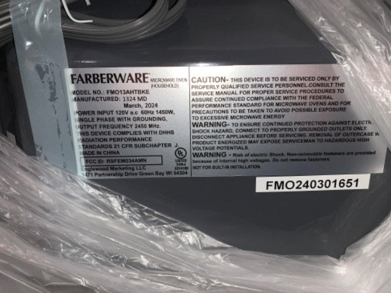 Photo 4 of ***USED - DIRTY - POWERS ON - UNABLE TO TEST FURTHER***
Farberware Countertop Microwave 1000 Watts, 1.3 Cu. Ft. - Microwave Oven With LED Lighting and Child Lock - Perfect for Apartments and Dorms - Easy Clean Stainless Steel