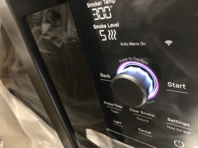 Photo 4 of **NEW OPENED TO INSPECT-FUNCTIONAL**
GE Profile™ Smart Indoor Pellet Smoker, with Active Smoke Filtration, 5 Smoke Control Settings, WiFi Connected, Electric, Countertop BBQ Appliance, Black