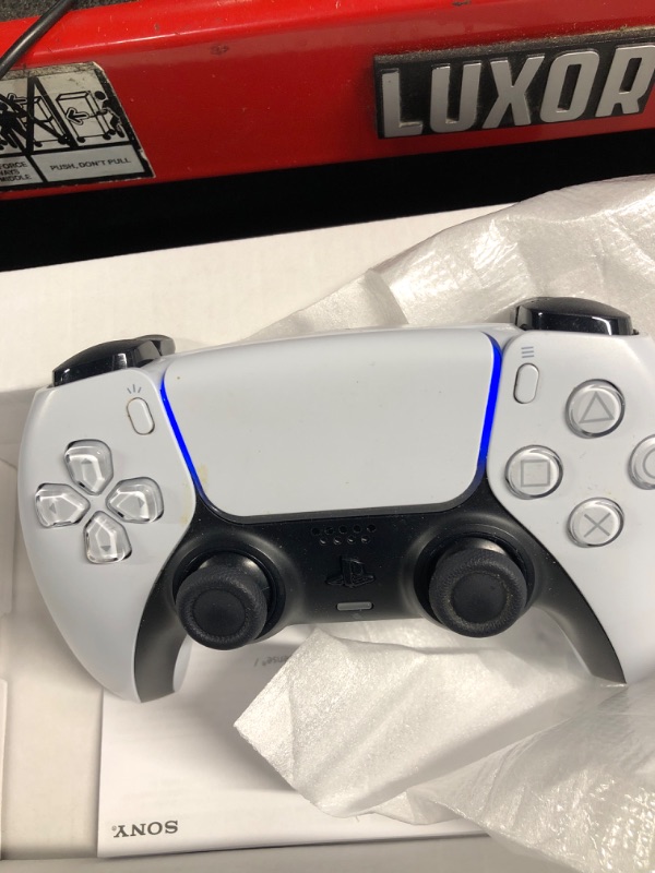 Photo 2 of **MINOR DAMAGE USED**
PlayStation DualSense® Wireless Controller - White