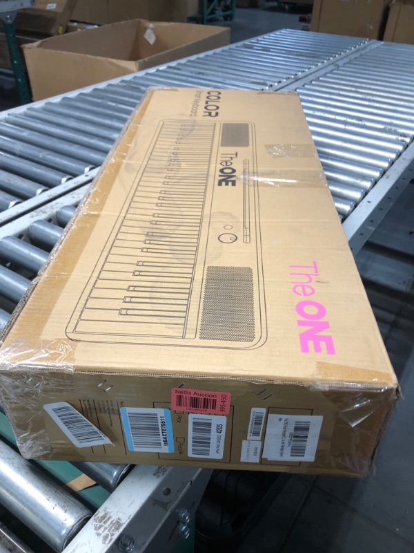 Photo 1 of The ONE Smart Keyboard COLOR 61 Lighted Keys Piano Keyboard, MIDI Electric Piano for Beginners with 256 Tones, 64 Polyphony, Built-in LED Lights and Free Apps (Green)