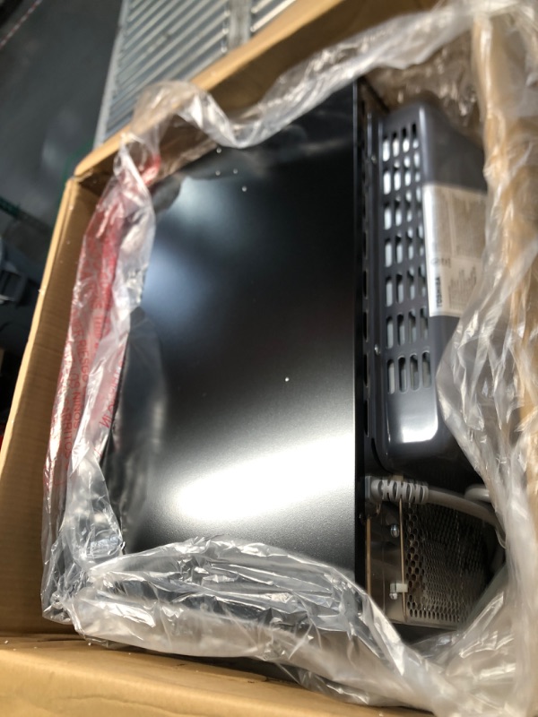 Photo 1 of (dented/ functional) TOSHIBA Air Fryer Combo 8-in-1 Countertop Microwave Oven, Convection, Broil, Odor removal, Mute Function, 12.4" Position Memory Turntable with 1.0 Cu.ft, Black stainless steel, ML2-EC10SA(BS)