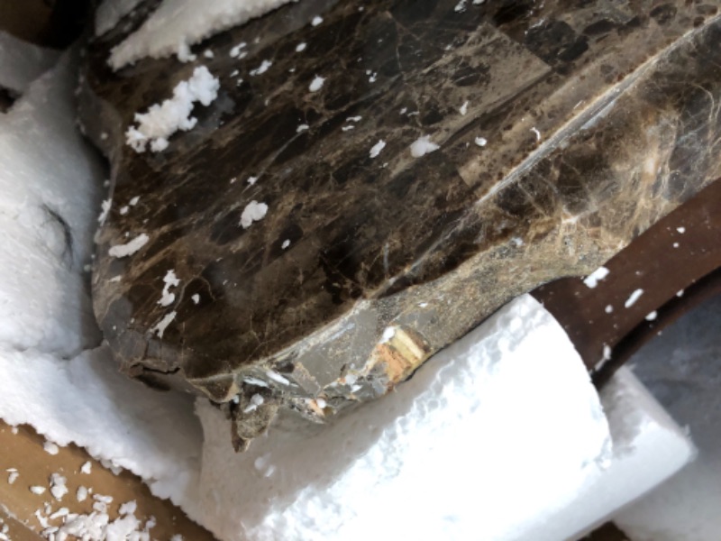 Photo 1 of ***TRUCK/TRAILER PICKUP ONLY - MAJOR DAMAGE - SEE PICTURES - LIKELY MISSING PARTS***
Acme Furniture Marble Top Coffee Table with Wood Legs in Dark Walnut, 34"D x 58"W x 21"H