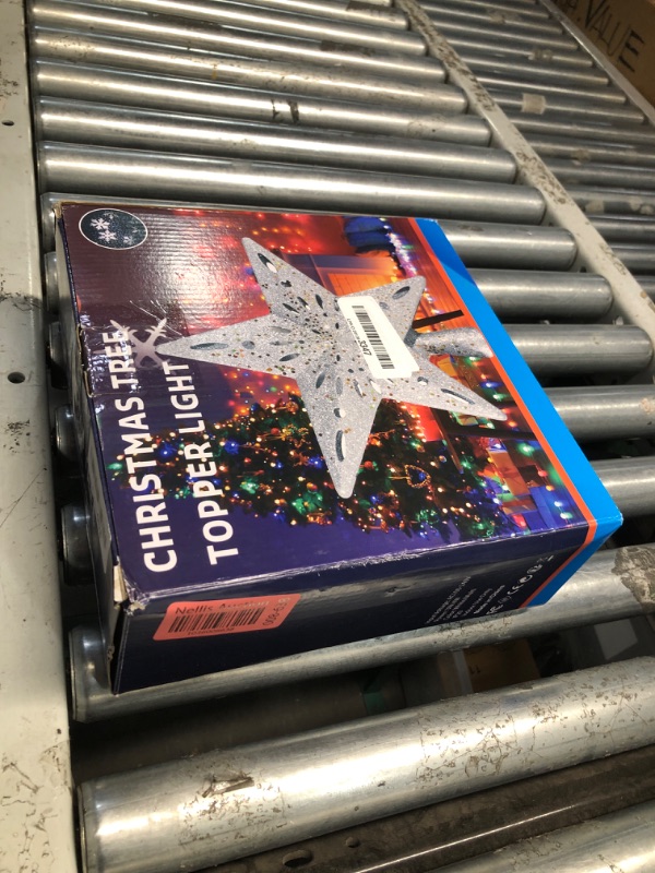 Photo 1 of DG-Direct Christmas Tree Topper Lighted Star [Silver],3D Hollow Sparkling Star Christmas Tree Topper with Rotating Magic Cool White Snowflake Projector for Christmas Tree Ornament (Silver)