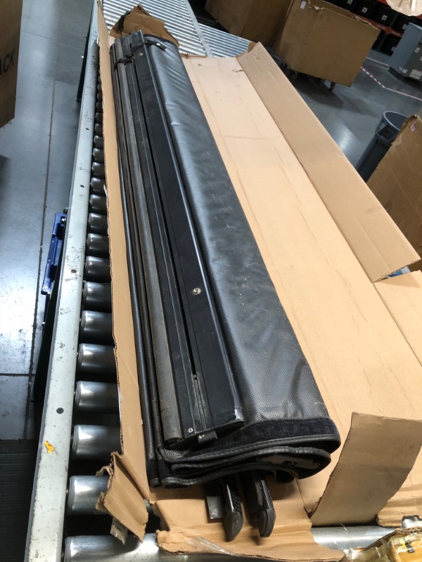 Photo 1 of **ITEM IS DIFFERENT FROM STOCK PHOTO** GMC fabric bed cover 66 inch width 6ft length