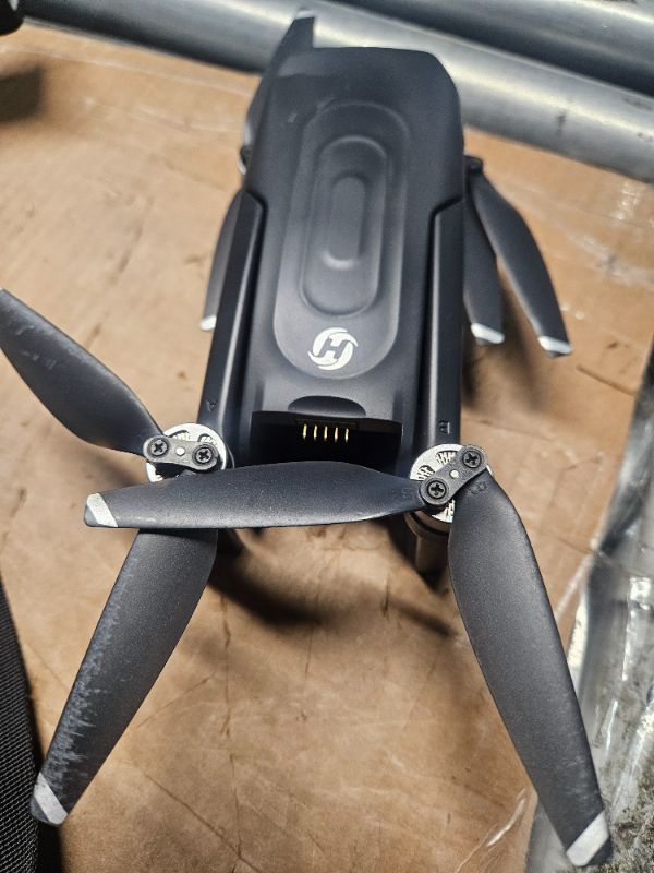 Photo 1 of **MINOR DAMAGE**REFER TO PHOTOS**
Holy Stone GPS Drone with 4K EIS Camera for Adults, HS175G 249g Foldable RC Quadcopter with Auto Return, Follow Me