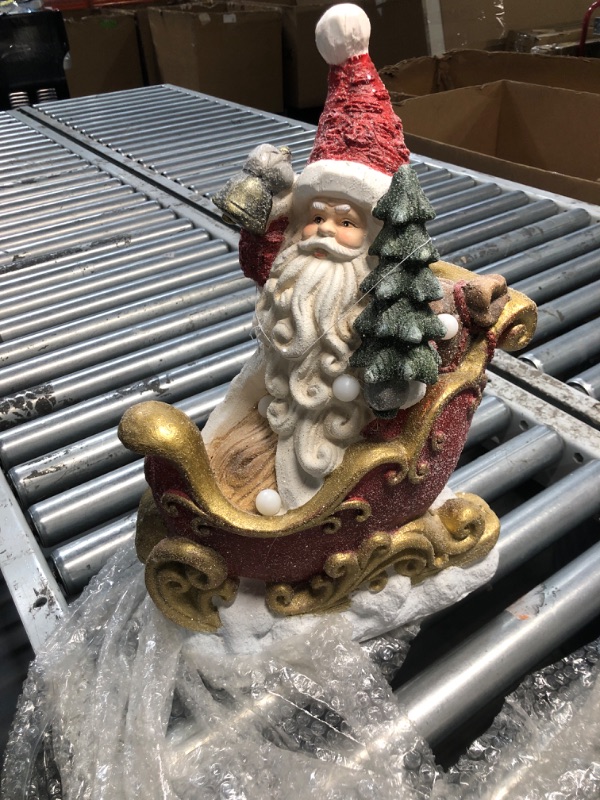 Photo 2 of (MINOR DAMAGE/ SEE NOTES)
Wowser LED Bulb Santa on Sleigh Resin Figurine, Festive Holiday Decor, Unique Home & Office Decor, 17 Inches High