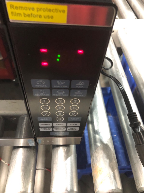 Photo 7 of ***NONREFUNDABLE - MAJOR DAMAGE - FOR PARTS ONLY - SEE COMMENTS***
COMMERCIAL CHEF 0.7 Cubic Foot Microwave with 10 Power Levels, Small Microwave with Push Button, 700W Countertop Microwave up to 99 Minute Timer and Digital Display, Stainless Steel