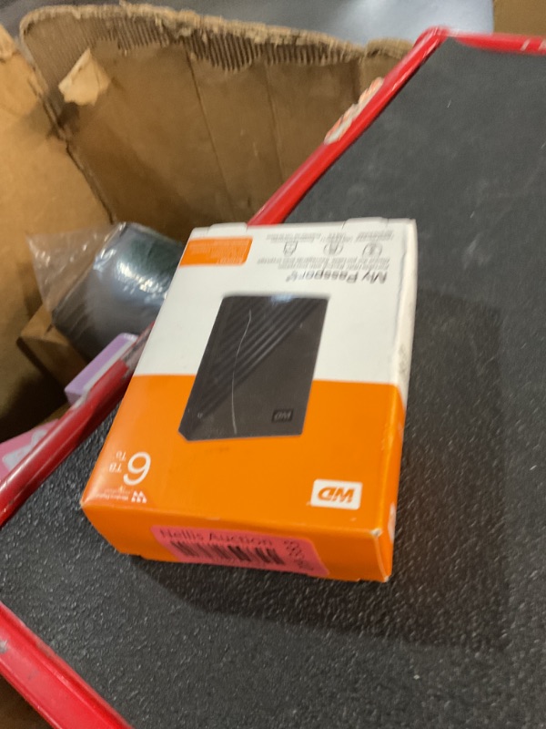 Photo 2 of ***(PARTS ONLY/ NON FUNCTIONAL/ NO RETURNS OR REFUNDS)***
WD 6TB My Passport, Portable External Hard Drive, Black, Backup Software with Defense Against ransomware, and Password Protection, USB 3.1/USB 3.0 Compatible - WDBR9S0060BBK-WESN