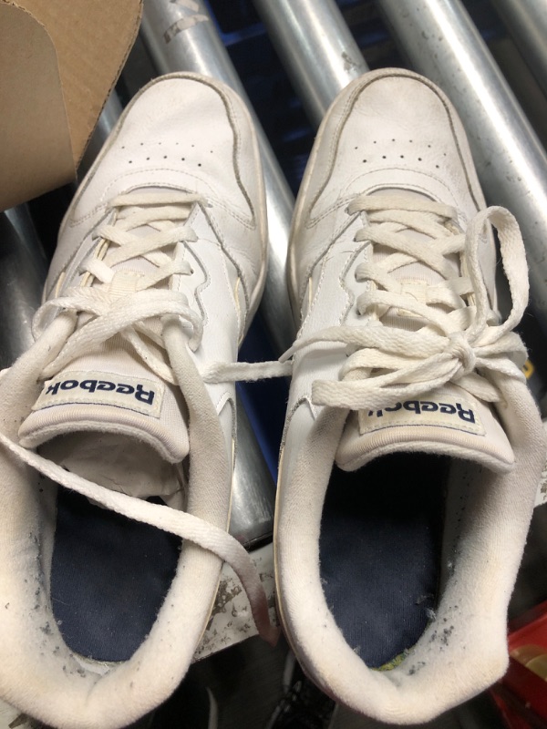 Photo 3 of **HEAVY USAGE, VERY WORN**
Reebok Unisex Court Advance Sneaker, Footwear White/Footwear White/Vector Navy, 11 US Men