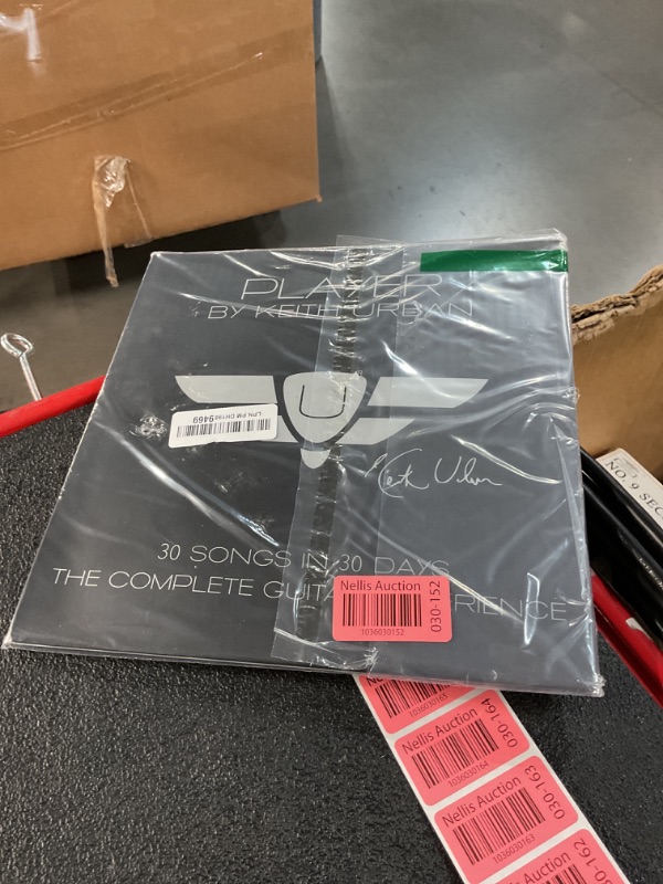 Photo 1 of Player by Keith Urban 30 Songs in 30 Days: The Complete Guitar Experience 30-disc DVD lesson set