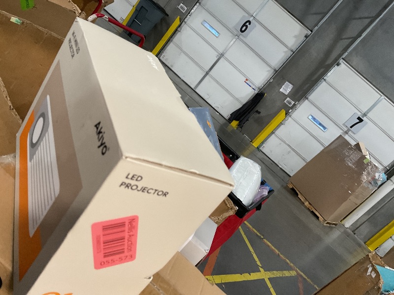 Photo 1 of Mini Projector with WiFi and Bluetooth, 1080P Supported Projector with Projector Stand, Portable Movie Projector for Home Theater/Outdoor, Compatible with iOS/Android/Laptop/TV Stick/HDMI/PS5