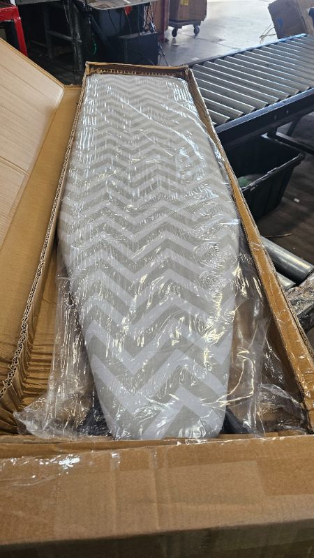 Photo 1 of Amazon Basics Full-Size Ironing Board - 4-Leg Fold-Up, Chevron Removable Cover, 60"L x 14"W x 38"H