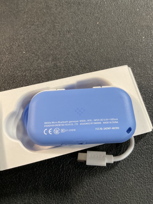 Photo 1 of 8Bitdo Micro Bluetooth Gamepad Pocket-sized Mini Controller for Switch, Android, and Raspberry Pi, Supports Keyboard Mode (Blue)