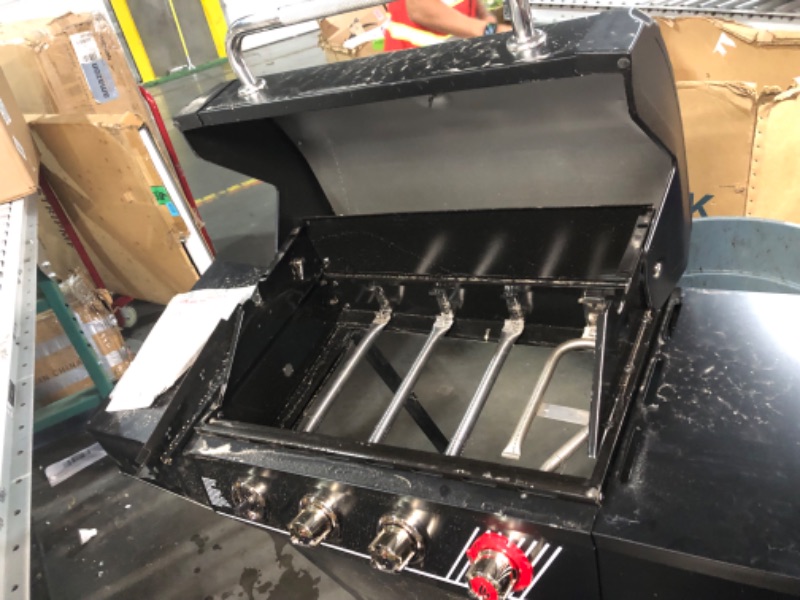 Photo 1 of ***TRUCK/TRAILER PICKUP ONLY - NONREFUNDABLE - MAJOR DAMAGE - SEE COMMENTS***
4-Burner Propane Gas Grill in Matte Black with TriVantage Multifunctional Cooking System
