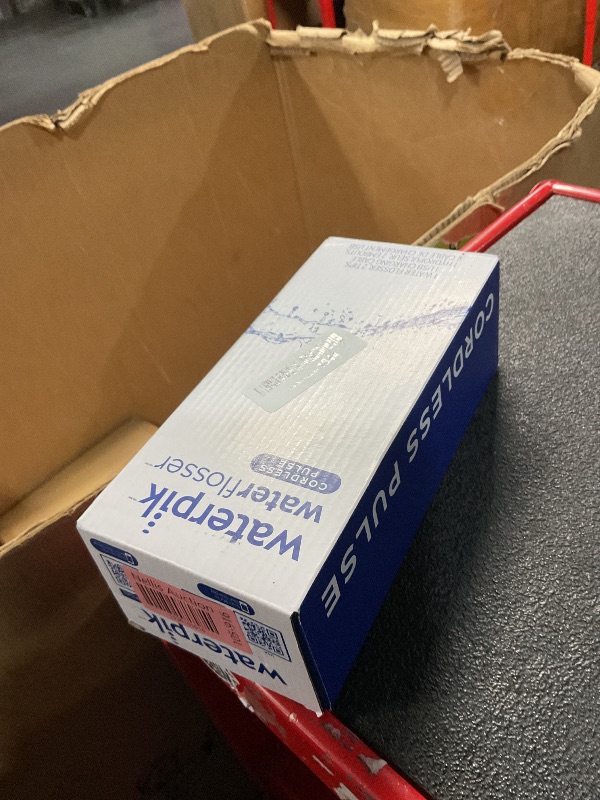 Photo 1 of Waterpik Cordless Pulse Rechargeable Portable Water Flosser for Teeth, Gums, Braces Care and Travel with 2 Flossing Tips, Waterproof, ADA Accepted, WF-20 Blue, Packaging May Vary