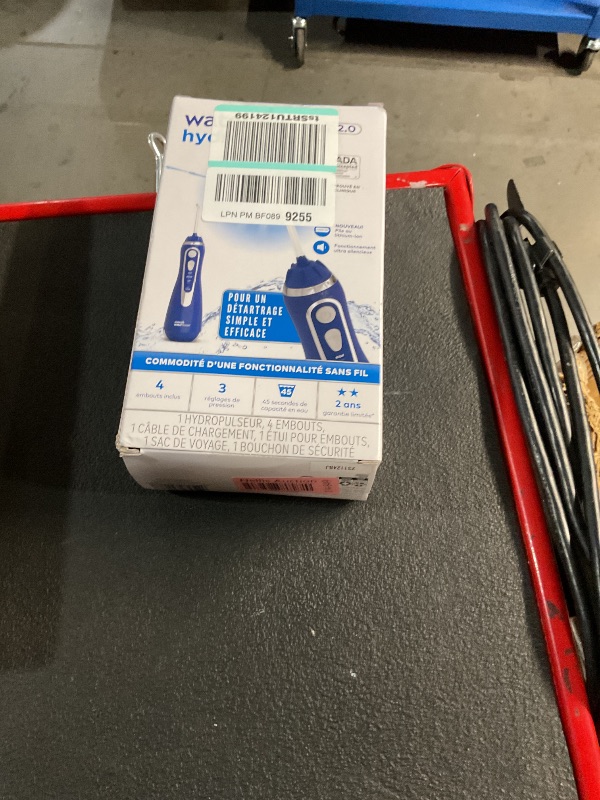 Photo 1 of Waterpik Cordless Advanced 2.0 Water Flosser For Teeth, Gums, Braces, Dental Care With Travel Bag and 4 Tips, ADA Accepted, Rechargeable, Portable, and Waterproof, Blue WP-583, Packaging May Vary