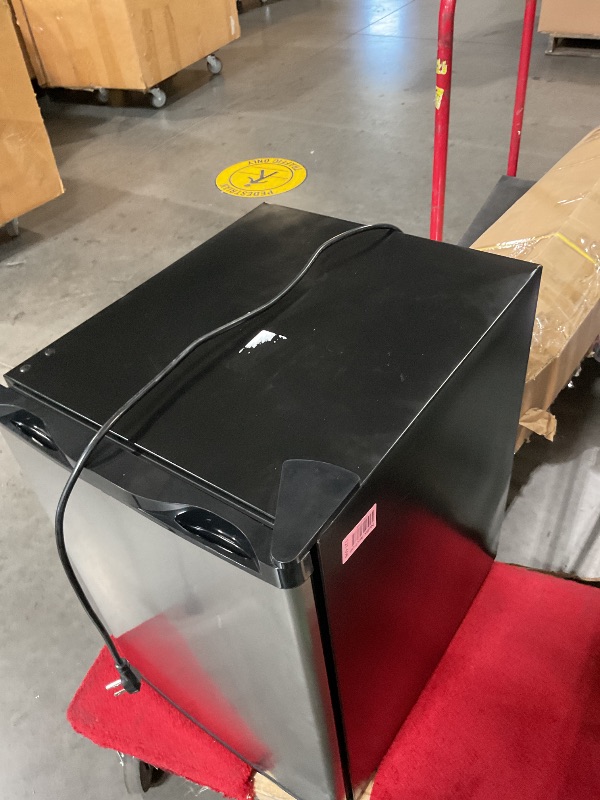 Photo 1 of **READ NOTES**(NEEDS TO BE CLEANED)-UNSURE OF FUNCTION
Electactic 2.1 Cu.ft Upright Freezer, Small Mini Freezer with Adjustable Thermostat, Removable Shelves, Reversible Single Door, for Bedroom/Home/Dorms/Apartment (Stainless Steel)