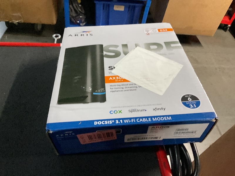 Photo 1 of ARRIS (G34) - Cable Modem Router Combo - Fast DOCSIS 3.1 Gigabit WiFi 6 (AX3000), Approved for Comcast Xfinity, Cox, Spectrum & More, 1 Gbps Max Internet Speeds 
SN: 42H5 G748 4100 227