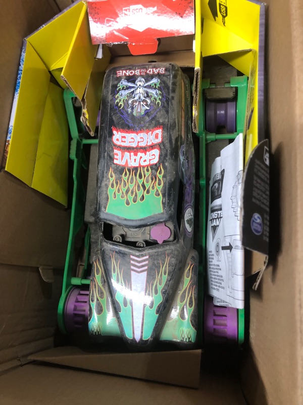 Photo 2 of ***DIRTY***Monster Jam, Official Grave Digger Trax All-Terrain Remote Control Outdoor Vehicle, 1:15 Scale, Kids Toys for Boys and Girls Ages 4 and Up