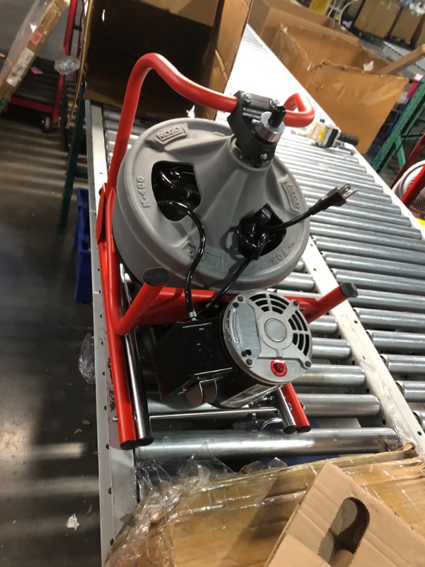 Photo 1 of ***USED - INCOMPLETE - SEE PICTURES - UNABLE TO VERIFY FUNCTIONALITY***
RIDGID 26998 Model K-400 Drain Cleaning 120-Volt Drum Machine Kit with C-45IW 1/2" x 75' Cable, White, Black, Red
