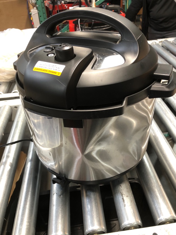Photo 1 of **LARGE DENT ON BACK** Instant Pot Duo 7-in-1 Electric Pressure Cooker, Slow Cooker, Rice Cooker, Steamer, Sauté, Yogurt Maker, Warmer & Sterilizer, Includes App With Over 800 Recipes, Stainless Steel, 8 Quart