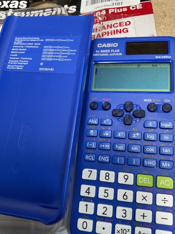 Photo 1 of Texas Instruments TI-84 Plus CE Color Graphing Calculator, Teal (Metallic)