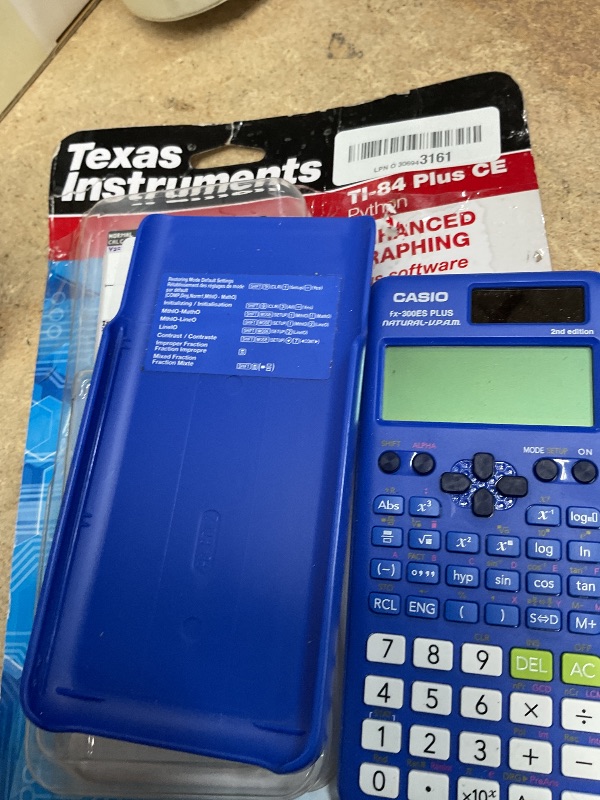 Photo 1 of Texas Instruments TI-84 Plus CE Color Graphing Calculator, Teal (Metallic)