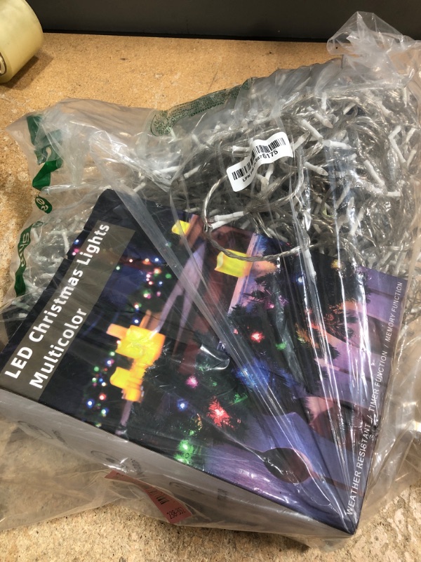 Photo 1 of 1500 LED 502FT Christmas String Lights Outdoor, Christmas Light with 8 Lighting Modes& Timer & Memory, Plug in Outdoor Waterproof Clear Wire Twinkle Light for for Xmas Yard Tree Party Decor Multicolor