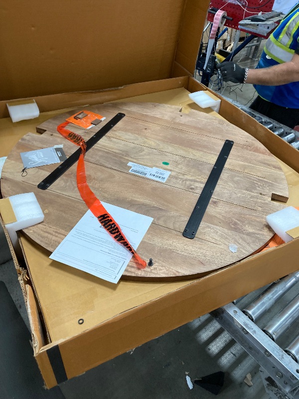 Photo 1 of Signature Design by Ashley Hanneforth Round Coffee Table, Brown/Black