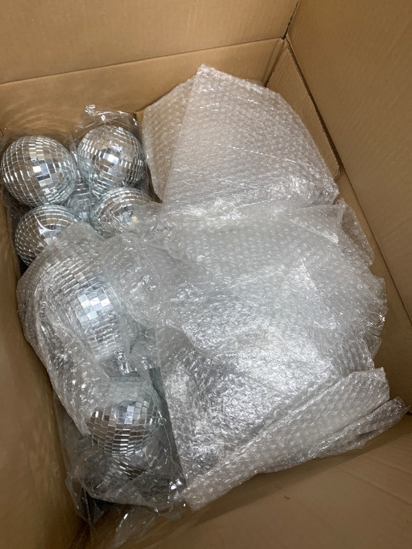 Photo 1 of Libima 12 Pack Large Disco Ball Bulk Silver Hanging Mirror Ball Ornament Different Size for Stage Club Christmas Party Decoration(12'', 8'', 6'', 4'')