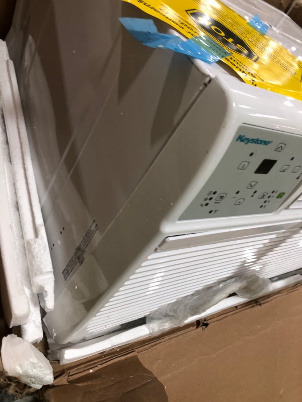 Photo 1 of ***FINAL SALE/PARTS ONLY ITEM*** DENTED**LG 10,000 BTU Through the Wall Air Conditioner, 115V, Cools up to 440 Sq. Ft. for Bedroom, Living Room, Apartment, with Remote, 3 Cool & Fan Speeds, Wall AC Unit, White