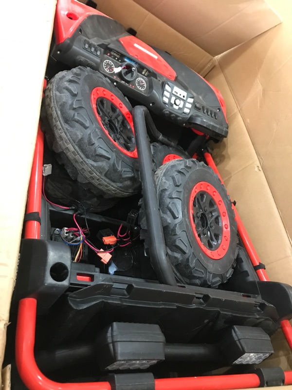 Photo 1 of ***SEE NOTES*** 
ELEMARA 2 Seater Ride on Car,12V Battery Powered Off-Road UTV Toy,4WD Electric Car with Remote Control,LED Lights,Bluetooth, 3 Speeds,2 Spring Suspension for 3-8 Boys & Girls,Red,48.2"x31"x31.5"
