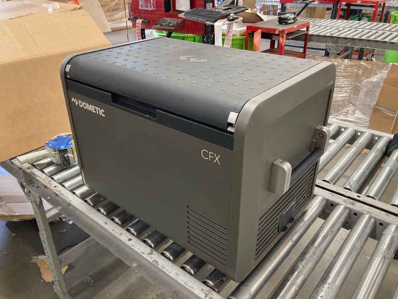 Photo 1 of ***USED - DAMAGED - NO PACKAGING - DOESN'T POWER ON - UNABLE TO TROUBLESHOOT***
Dometic CFX5 55 Liter IM Portable Refrigerator and Freezer, Powered by AC/DC